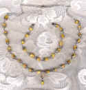 Bright as a summer's day, yellow rose beads. Click here for enlarged photo
