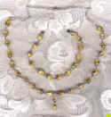 Bright as a summer's day, yellow rose beads. Click here for enlarged photo
