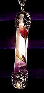Micro-miniature rose in a vial